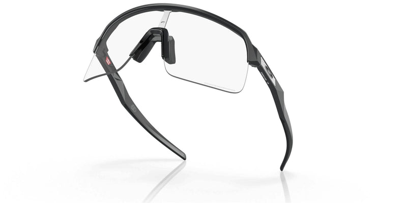 Load image into Gallery viewer, Oakley Sutro Lite Clear To Black Iridium Photochromic Lenses Matte Carbon Frame
