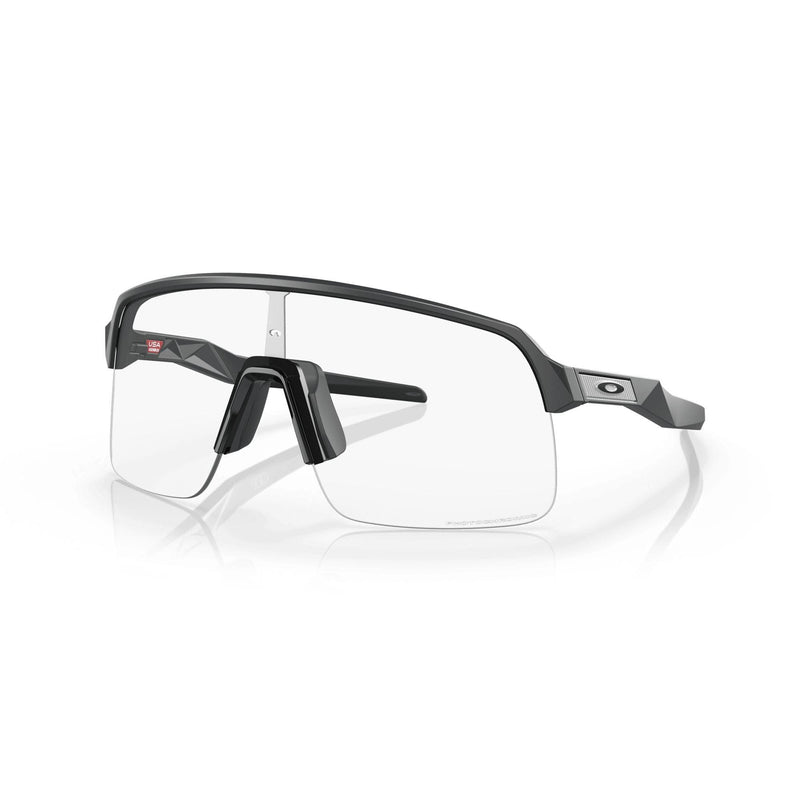 Load image into Gallery viewer, Oakley Sutro Lite Clear To Black Iridium Photochromic Lenses Matte Carbon Frame
